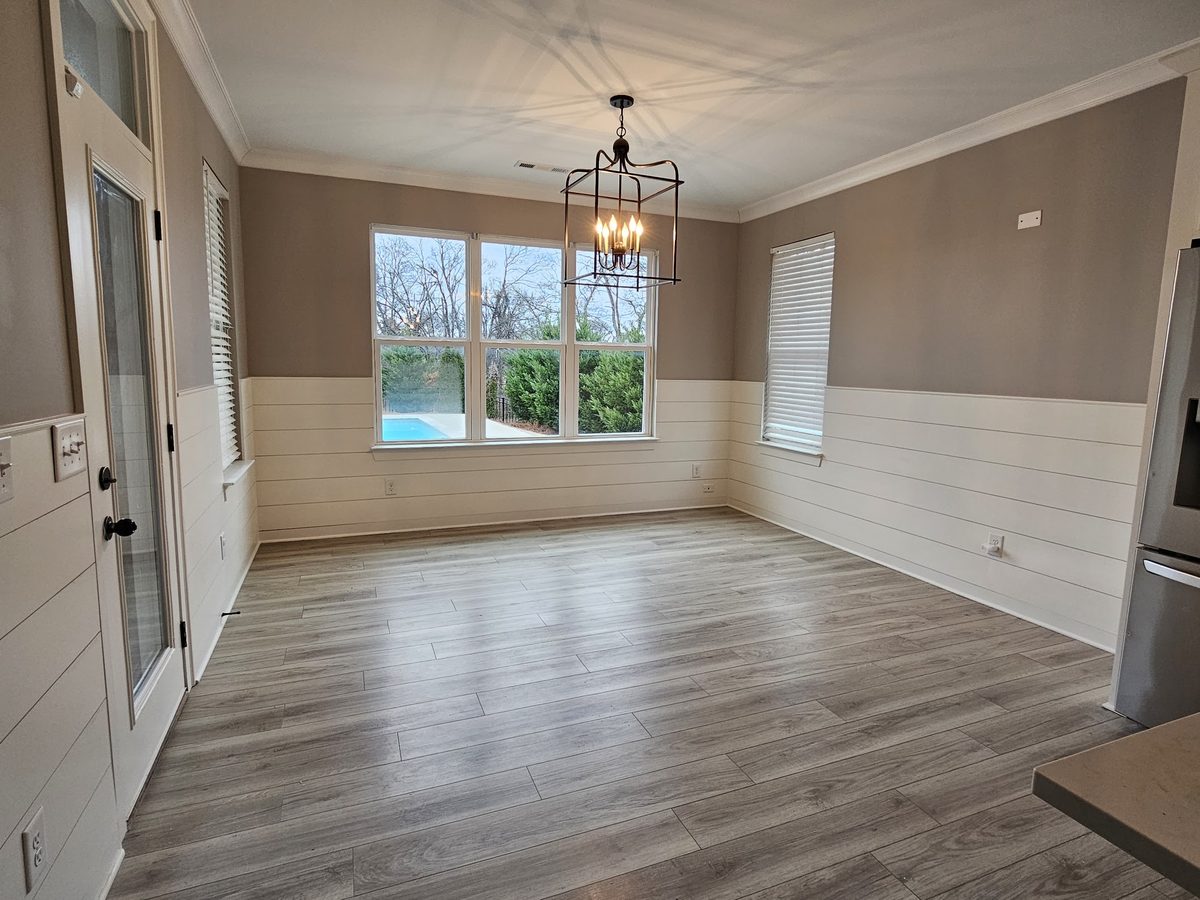 Dining room with painted walls and white trim