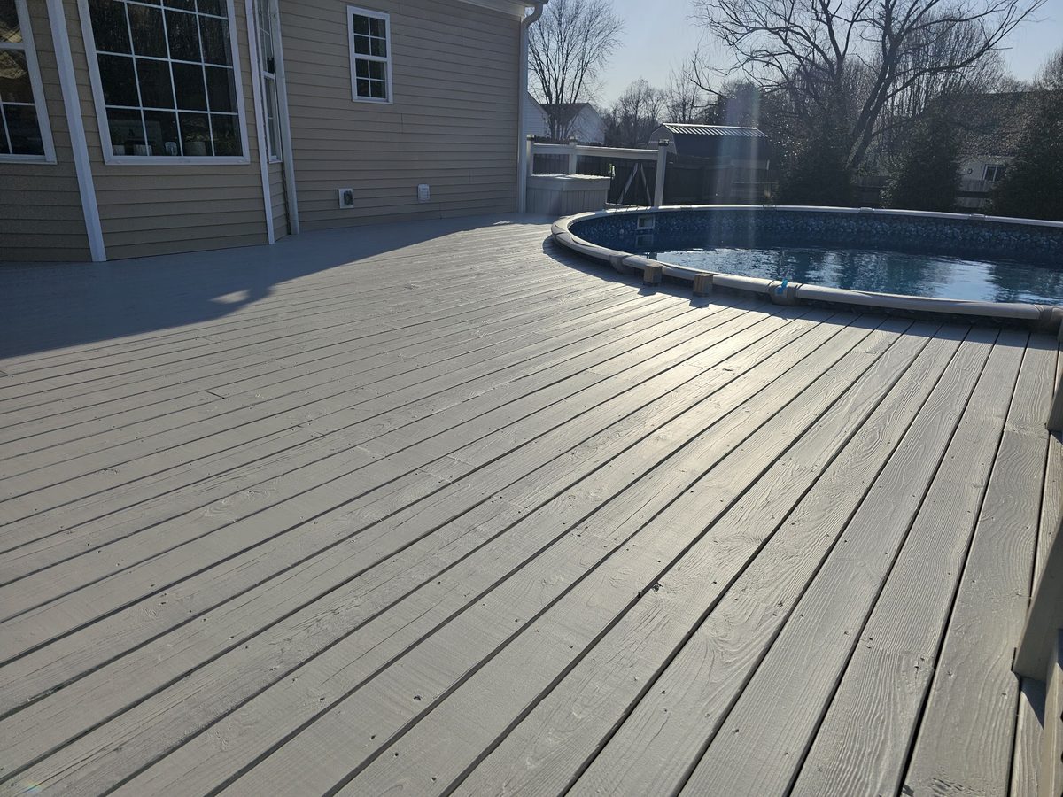 Wood deck surrounding a pool